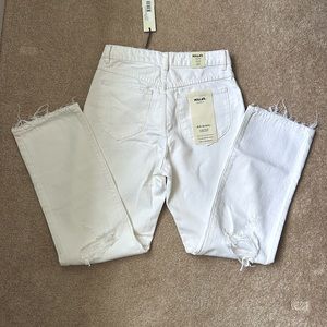 Free People Rollas distressed jeans.